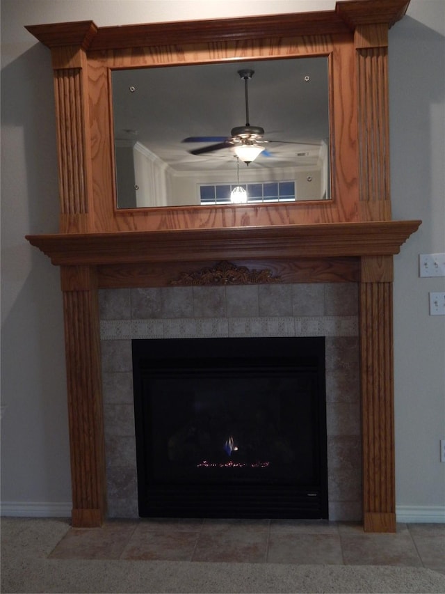 details with a fireplace and ceiling fan