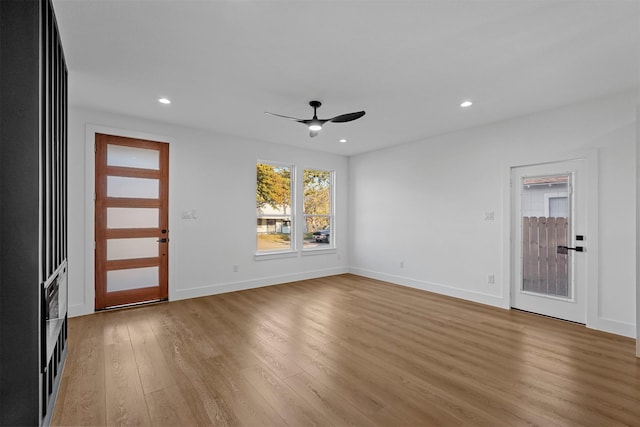 entrance foyer featuring light wood-type flooring and ceiling fan