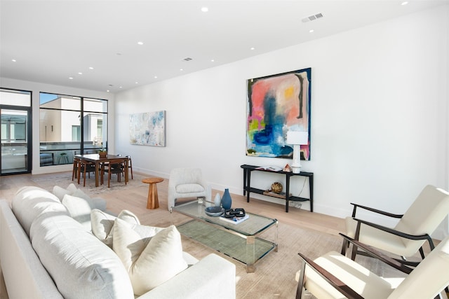 living room featuring light wood-type flooring