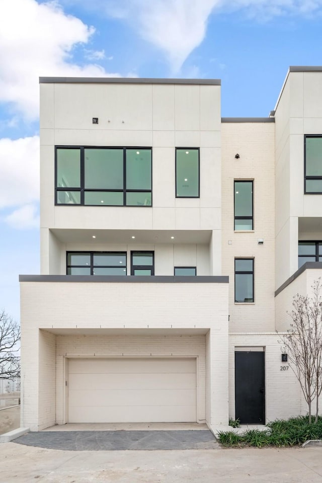 modern home featuring a garage