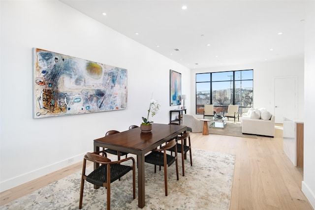 dining room with light hardwood / wood-style floors