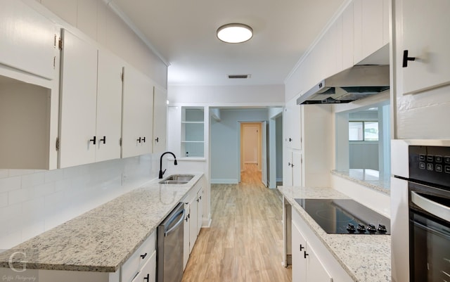 kitchen with sink, stainless steel dishwasher, black electric cooktop, white cabinets, and light wood-type flooring