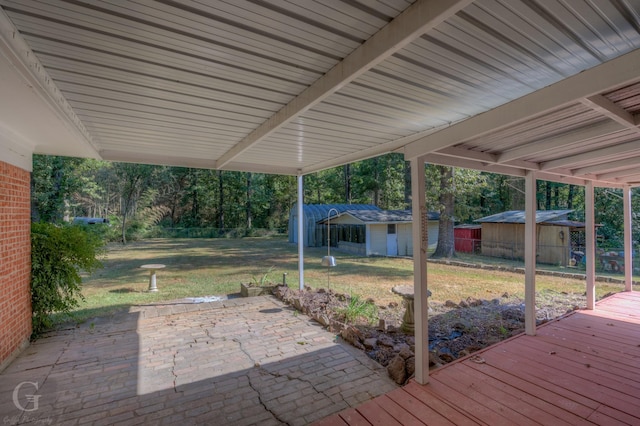 view of patio / terrace with a storage unit