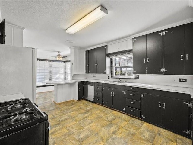 kitchen featuring sink, ceiling fan, dishwasher, black range with gas cooktop, and refrigerator