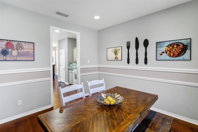 dining room featuring dark hardwood / wood-style floors