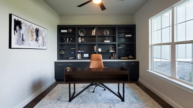 office space with ceiling fan and light hardwood / wood-style floors