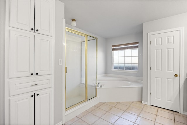 bathroom featuring tile patterned floors and plus walk in shower