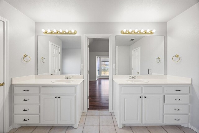 bathroom featuring vanity and tile patterned flooring