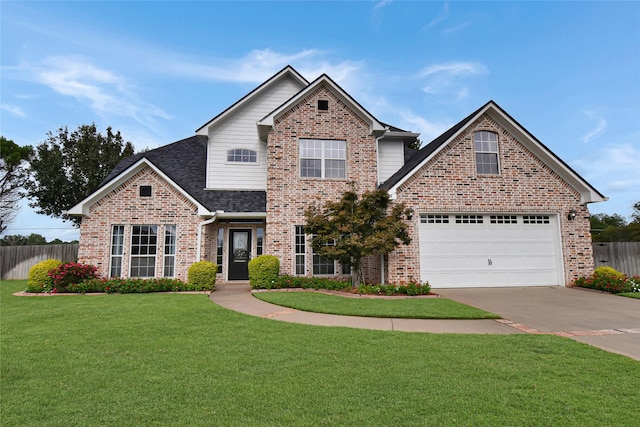 front of property with a front lawn and a garage