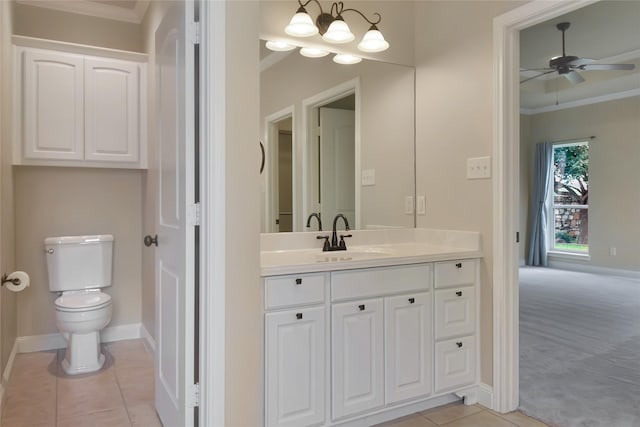 bathroom with tile patterned flooring, ceiling fan with notable chandelier, toilet, and ornamental molding