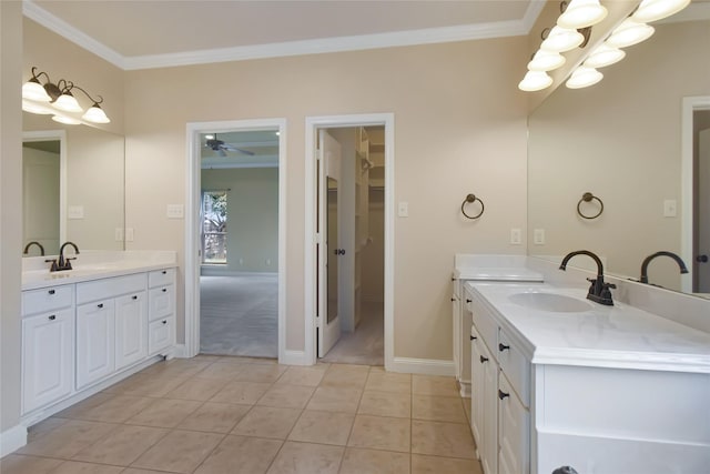 bathroom featuring tile patterned floors, ceiling fan, crown molding, and vanity