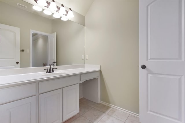 bathroom featuring tile patterned floors and vanity