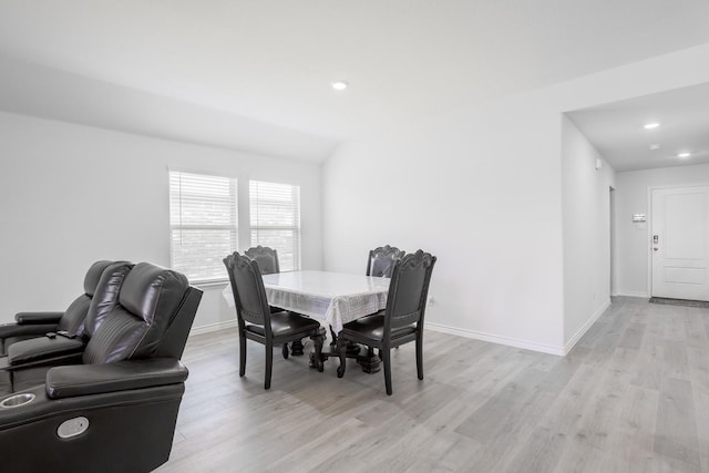 dining area with light hardwood / wood-style flooring