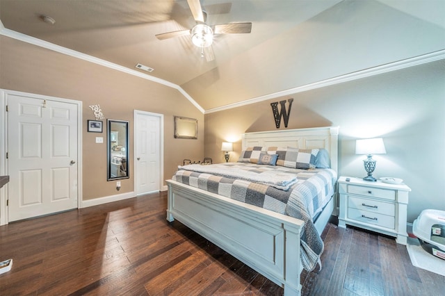 bedroom with ceiling fan, dark hardwood / wood-style flooring, lofted ceiling, and ornamental molding