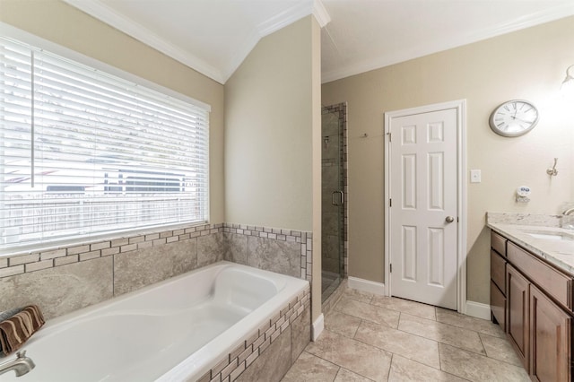 bathroom with tile patterned floors, vanity, independent shower and bath, and ornamental molding