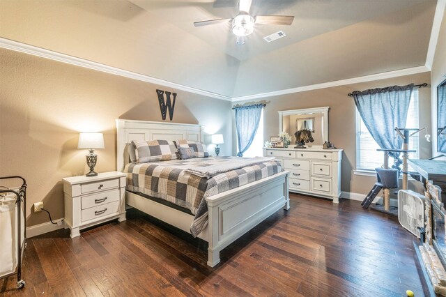 bedroom featuring lofted ceiling, dark hardwood / wood-style floors, ceiling fan, and crown molding