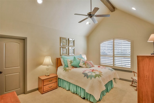 bedroom with ceiling fan, beam ceiling, light colored carpet, and high vaulted ceiling