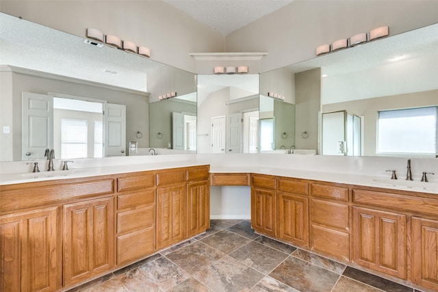 bathroom featuring vanity and a textured ceiling