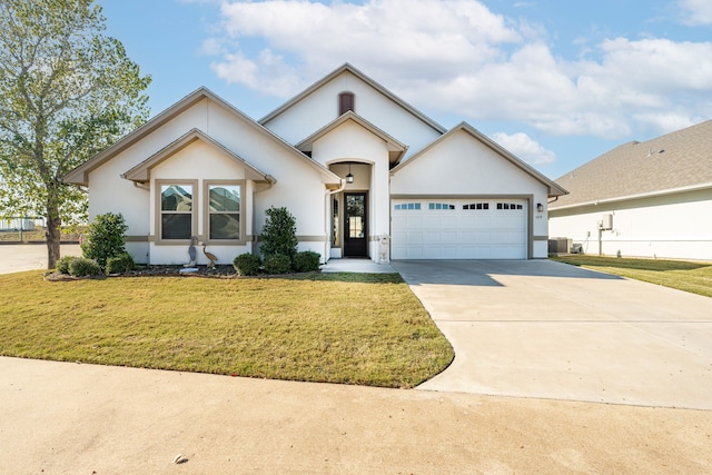 view of front of house featuring a garage, central AC unit, and a front lawn