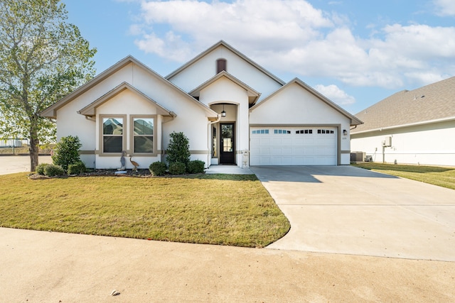 105 Easy St, Glen Rose, TX 76043 - view of front facade featuring a garage, stucco siding, driveway, and a front yard