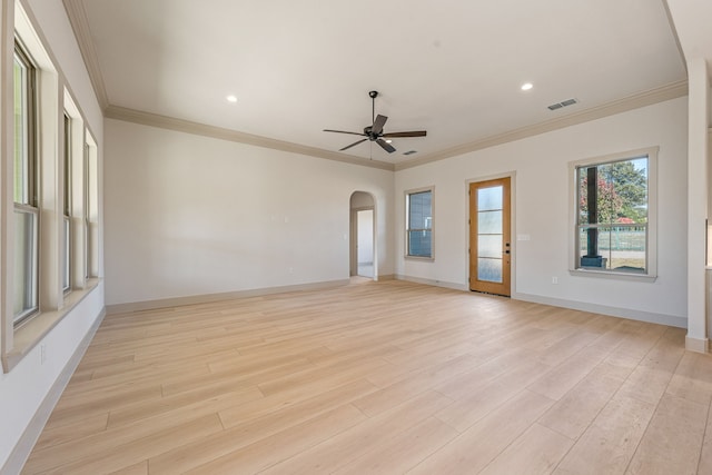 unfurnished room featuring crown molding, ceiling fan, and light hardwood / wood-style flooring