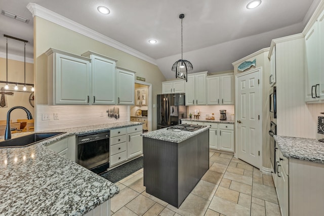 kitchen featuring a kitchen island, sink, hanging light fixtures, black appliances, and light stone countertops