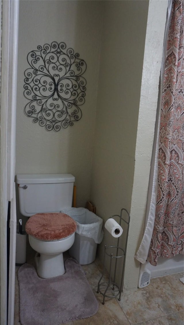 bathroom featuring toilet