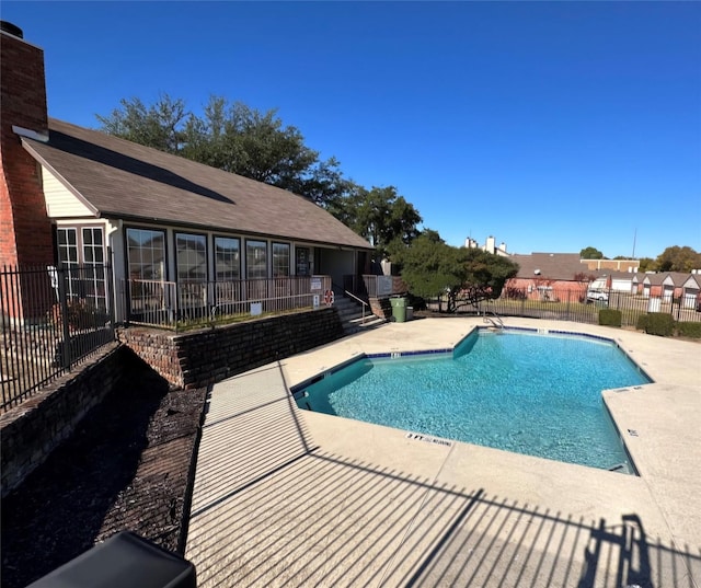 view of pool featuring a patio