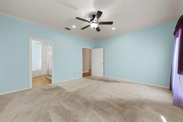 unfurnished bedroom with ceiling fan, ornamental molding, light carpet, and connected bathroom