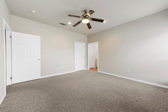 unfurnished bedroom featuring carpet flooring and ceiling fan