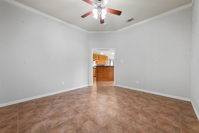 spare room with ceiling fan and ornamental molding