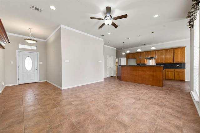 kitchen with pendant lighting, a center island, crown molding, ceiling fan, and light tile patterned flooring