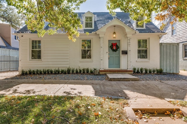 view of new england style home