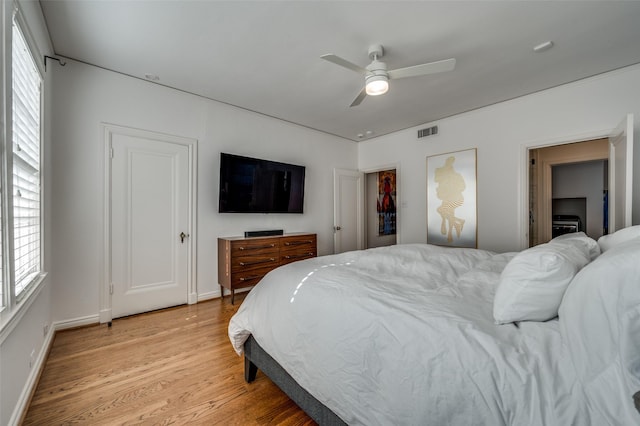 bedroom featuring wood-type flooring and ceiling fan