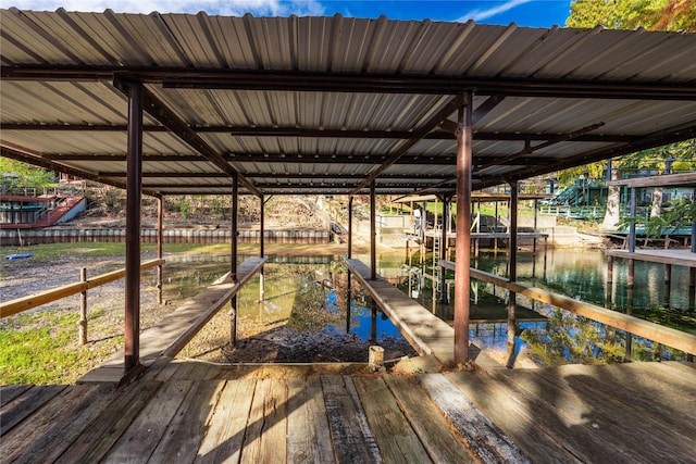 view of dock with a water view