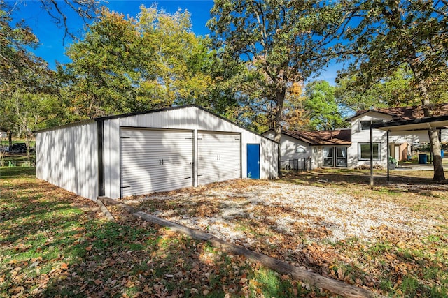 view of outdoor structure with a garage