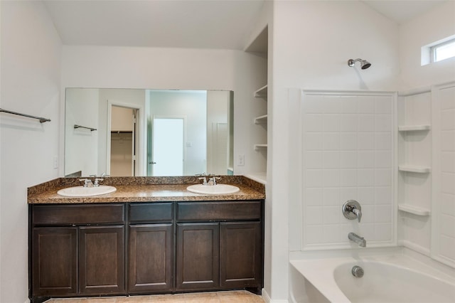 bathroom with shower / washtub combination and vanity