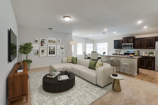 living room with light colored carpet