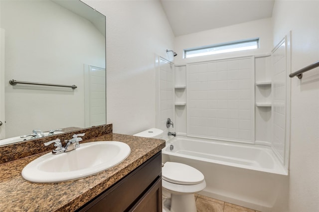 full bathroom featuring vanity, tile patterned floors, shower / washtub combination, vaulted ceiling, and toilet