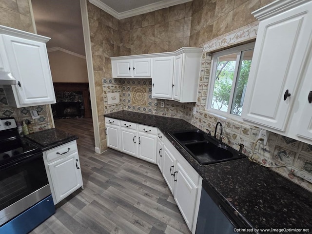 kitchen featuring sink, white cabinets, and stainless steel appliances