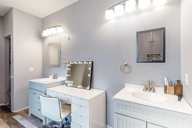 bathroom featuring vanity and wood-type flooring