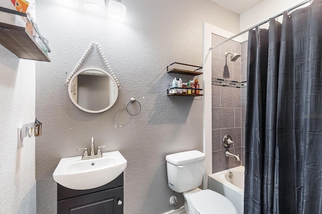 full bathroom featuring vanity, toilet, and shower / bathtub combination with curtain