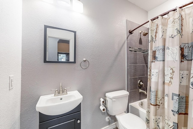 full bathroom with shower / bath combo, toilet, and vanity