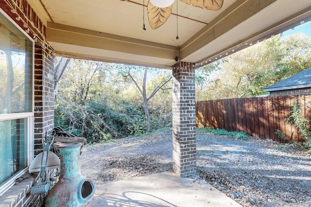 view of patio featuring ceiling fan