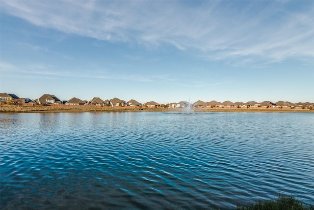 view of water feature with a residential view