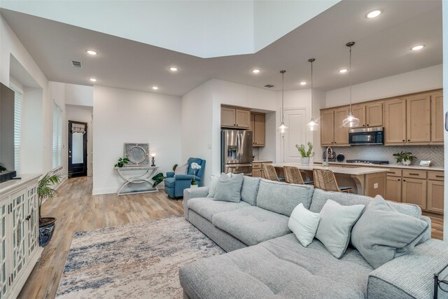 living room with light wood-type flooring