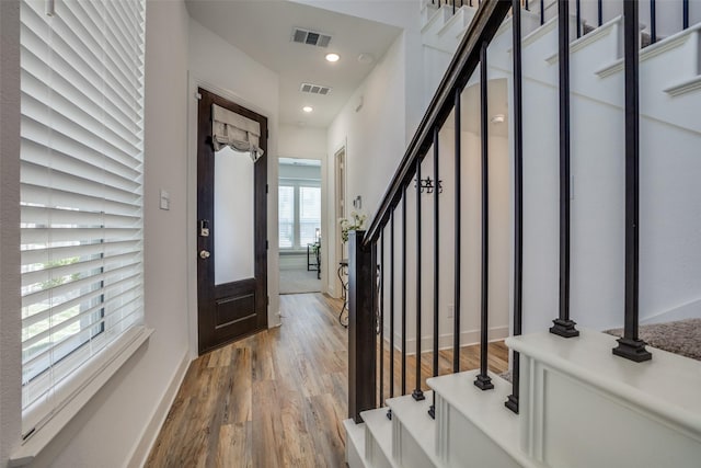 1145 Queensdown Way, Forney, TX 75126 - entryway with wood finished floors, stairway, recessed lighting, and baseboards