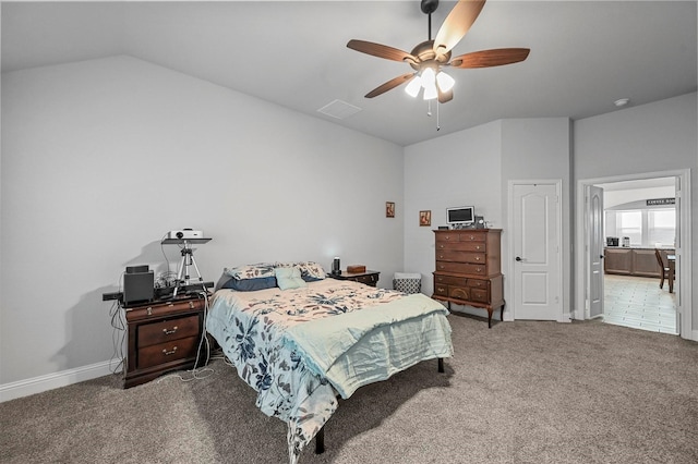 bedroom featuring carpet, lofted ceiling, and ceiling fan