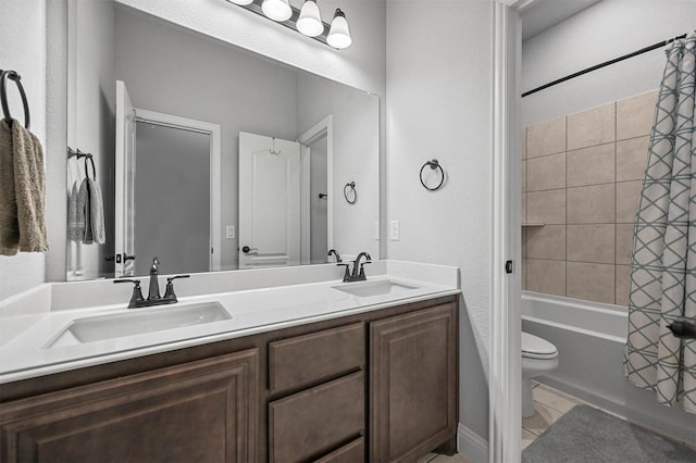 full bathroom featuring toilet, tile patterned floors, vanity, and shower / bathtub combination with curtain