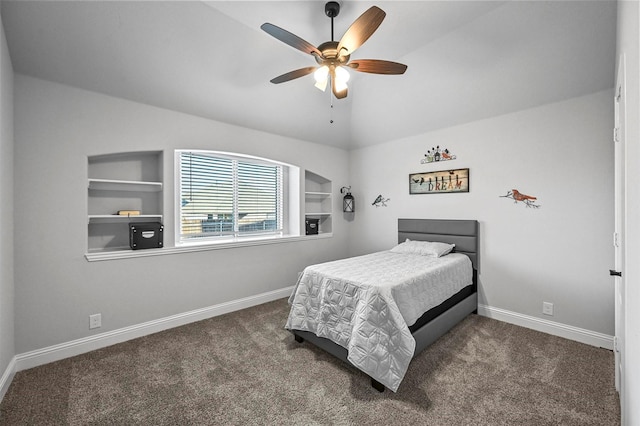 bedroom featuring ceiling fan, lofted ceiling, and dark colored carpet